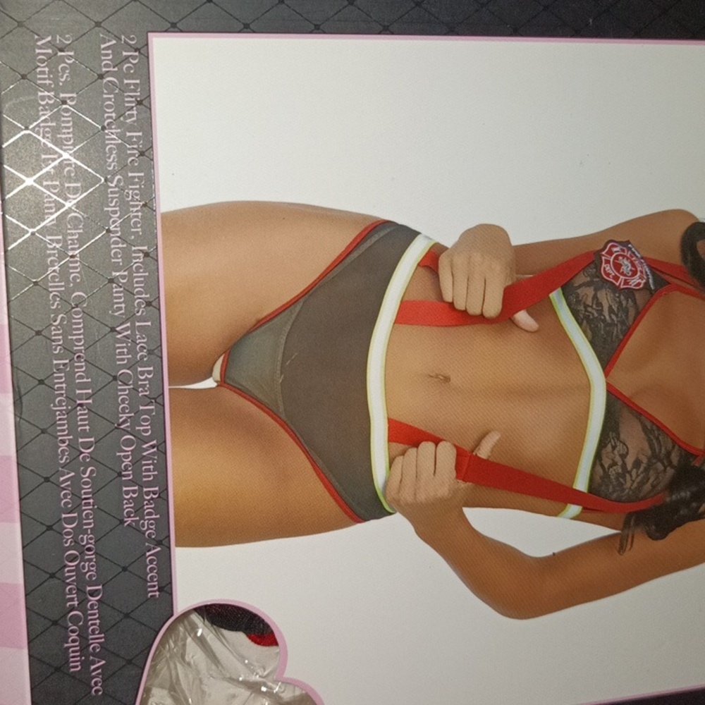 Two piece flirty firefighter . - Picture 3 of 4
